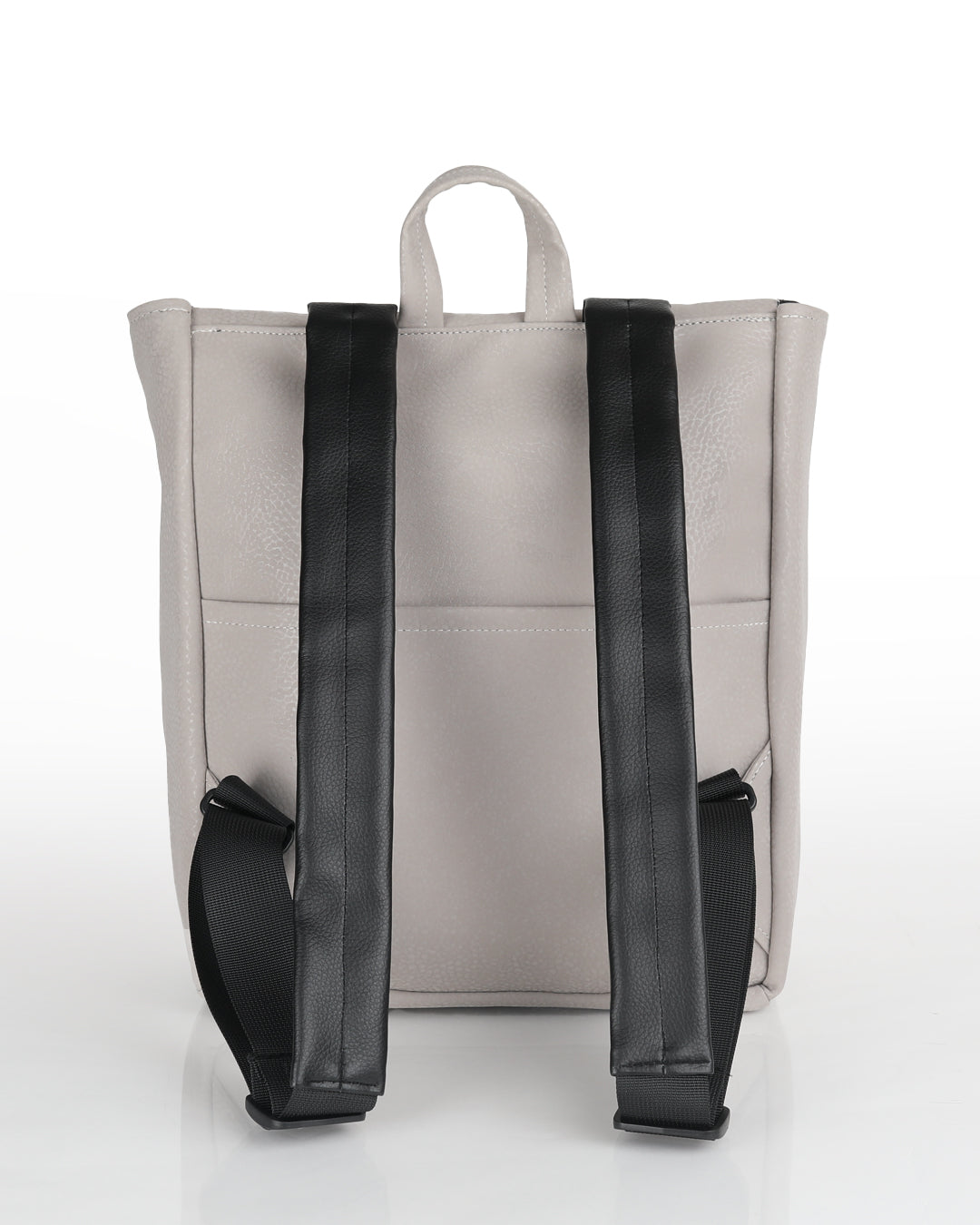 תיק גב למחשב נייד טבעוני - מיני טוקיו אבן, מצולם מהגב וניתן לראות את הרצועות המרופדות שלו ואת התא האחורי, על רקע לבן.